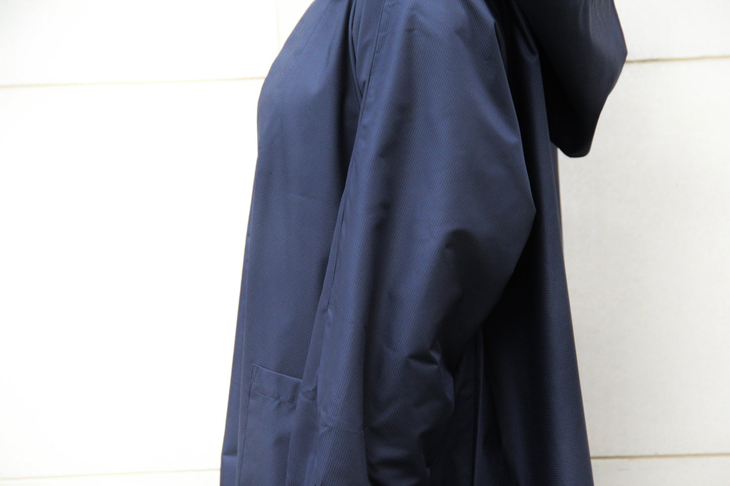 Navy blue cuffed rain coat